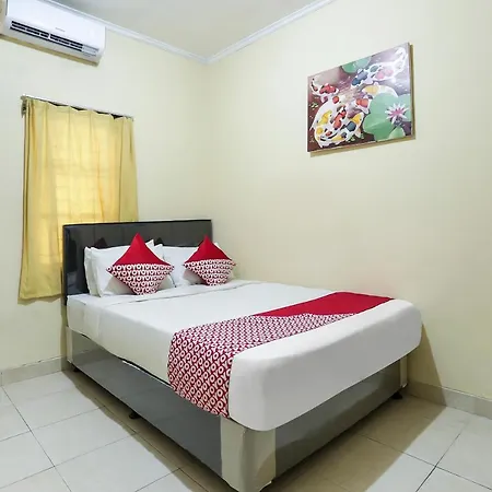 Oyo 90907 Handika Jaya Bs